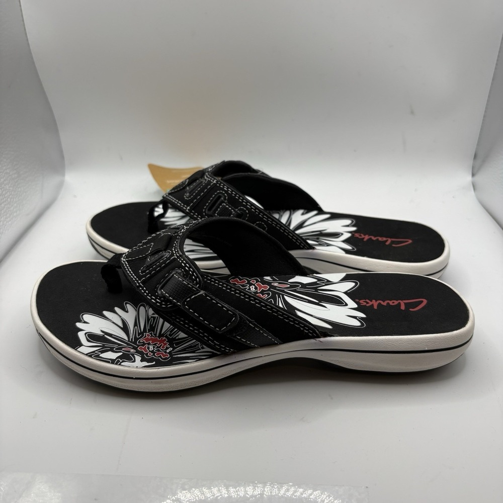 Clarks Breeze Sea women's sandals, black floral footbed and cushioned Sz 7M